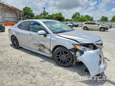 Czwarte zdjęcie samochodu z boku: 2019 TOYOTA CAMRY HYBRID SE VIN:4T1B21HK3KU515466 - miniatura