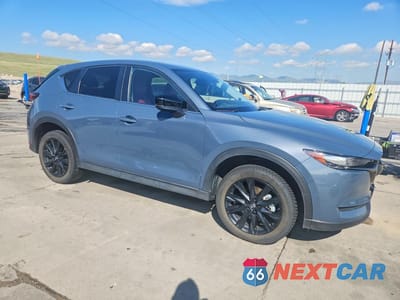 Czwarte zdjęcie samochodu z boku: 2021 MAZDA CX-5 CARBON EDITION VIN:JM3KFBCY3M0454342 - miniatura