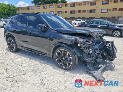 Czwarte zdjęcie samochodu z boku: 2026 BMW X1 M35I VIN:WBX13EF07T5555506 - miniatura