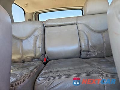 Zdjęcie 10 z 13 samochodu: 2002 GMC YUKON VIN:1GKEK13ZX2R213153 - miniatura