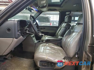 Zdjęcie 7 z 13 samochodu: 2001 CHEVROLET SUBURBAN K1500 VIN:1GNFK16T81J240816 - miniatura