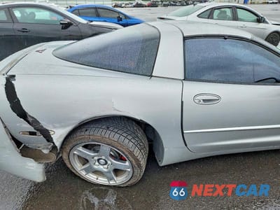Zdjęcie 10 z 12 samochodu: 1998 CHEVROLET CORVETTE VIN:1G1YY22G1W5119777 - miniatura