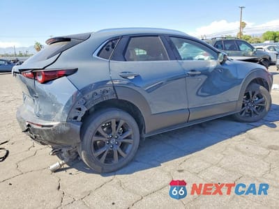 Trzecie zdjęcie samochodu z tyłu: 2024 MAZDA CX-30 PREFERRED VIN:3MVDMBCM2RM648884 - miniatura