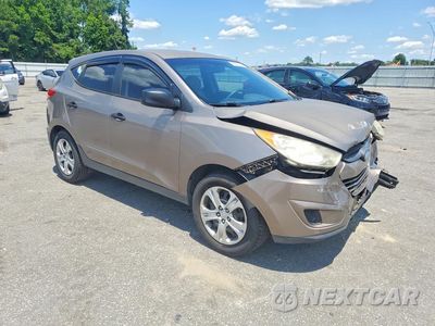 Czwarte zdjęcie samochodu z boku: 2011 HYUNDAI TUCSON GL VIN:KM8JT3AB6BU150408 - miniatura