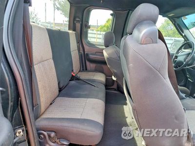 Zdjęcie 10 z 12 samochodu: 2003 FORD F150 VIN:1FTRX17223NA31774 - miniatura