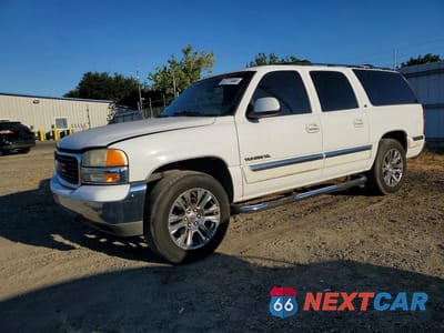 2001 GMC YUKON XL C1500 3GKEC16T31G104391 - główne zdjęcie licytacji z USA - miniatura