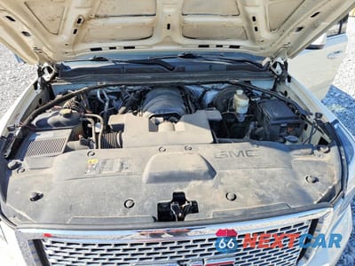 Zdjęcie 12 z 13 samochodu: 2015 GMC YUKON DENALI VIN:1GKS2CKJ7FR273441 - miniatura