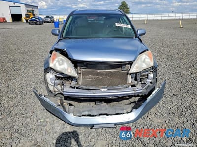 Piąte zdjęcie samochodu w środku: 2011 HONDA CR-V EXL VIN:JHLRE4H70BC023896 - miniatura