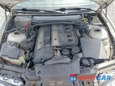 Zdjęcie 11 z 12 samochodu: 2005 BMW 325 I VIN:WBAEV33465KW17628 - miniatura