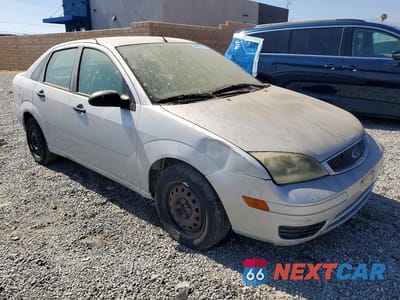Czwarte zdjęcie samochodu z boku: 2007 FORD FOCUS VIN:1FAHP34NX7W232124 - miniatura