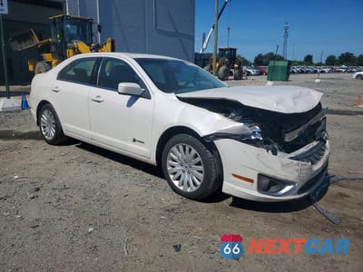 Czwarte zdjęcie samochodu z boku: 2010 FORD FUSION HYBRID VIN:3FADP0L32AR381361 - miniatura