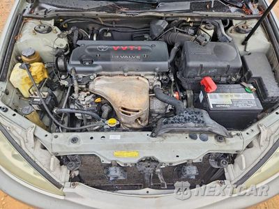 Zdjęcie 11 z 12 samochodu: 2005 TOYOTA CAMRY LE VIN:4T1BE30K25U971249 - miniatura