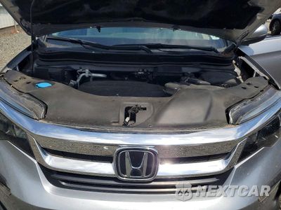 Zdjęcie 11 z 12 samochodu: 2021 HONDA PILOT EXL VIN:5FNYF6H54MB082505 - miniatura