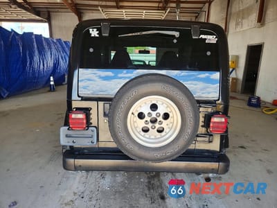 Zdjęcie 6 z 12 samochodu: 1999 JEEP WRANGLER / TJ SAHARA VIN:1J4FY49S1XP401485 - miniatura