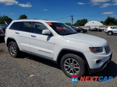Czwarte zdjęcie samochodu z boku: 2014 JEEP GRAND CHEROKEE LIMITED VIN:1C4RJFBG5EC482181 - miniatura
