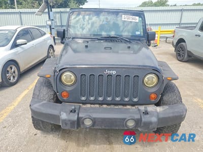 Piąte zdjęcie samochodu w środku: 2010 JEEP WRANGLER UNLIMITED SAHARA VIN:1J4HA5H13AL198349 - miniatura