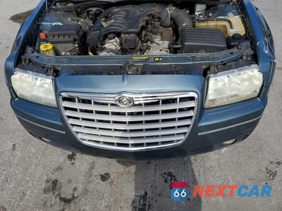 Zdjęcie 11 z 12 samochodu: 2005 CHRYSLER 300 TOURING VIN:2C3JA53G95H131703 - miniatura