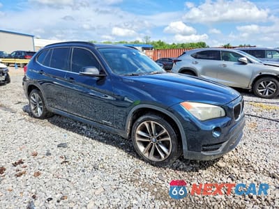 Czwarte zdjęcie samochodu z boku: 2013 BMW X1 SDRIVE28I VIN:WBAVM1C50DVW46474 - miniatura