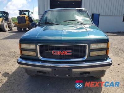 Piąte zdjęcie samochodu w środku: 1995 GMC SIERRA K2500 VIN:2GTFK29K1S1579575 - miniatura