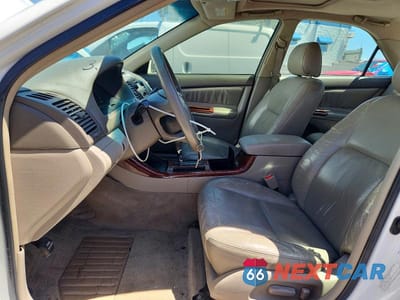 Zdjęcie 7 z 12 samochodu: 2002 TOYOTA CAMRY XLE VIN:4T1BE32KX2U048882 - miniatura