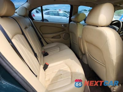 Zdjęcie 10 z 13 samochodu: 2004 JAGUAR X-TYPE ESTATE 2.5 VIN:SAJEA52D74XD99510 - miniatura