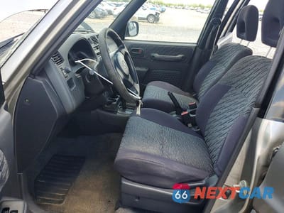 Zdjęcie 7 z 13 samochodu: 2000 TOYOTA RAV4 BASE VIN:JT3HP10V2Y0243163 - miniatura