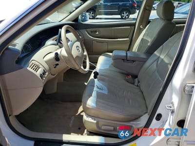 Zdjęcie 7 z 12 samochodu: 2002 TOYOTA AVALON XLS VIN:4T1BF28B62U244851 - miniatura