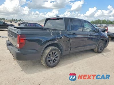 Trzecie zdjęcie samochodu z tyłu: 2024 HONDA RIDGELINE SPORT VIN:5FPYK3F1XRB032281 - miniatura