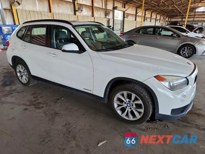 Czwarte zdjęcie samochodu z boku: 2014 BMW X1 XDRIVE28I VIN:WBAVL1C55EVY16722 - miniatura