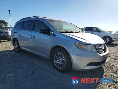 Czwarte zdjęcie samochodu z boku: 2011 HONDA ODYSSEY EXL VIN:5FNRL5H65BB021189 - miniatura