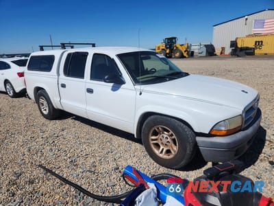 Czwarte zdjęcie samochodu z boku: 2004 DODGE DAKOTA QUAD SPORT VIN:1D7HL38K44S777556 - miniatura