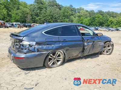 Trzecie zdjęcie samochodu z tyłu: 2018 BMW 330 XIGT VIN:WBA8Z9C57JG827780 - miniatura