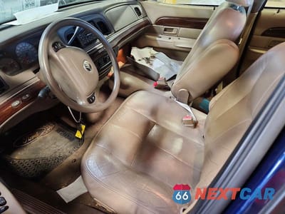 Zdjęcie 7 z 12 samochodu: 2004 MERCURY GRAND MARQUIS GS VIN:2MEFM74W04X605101 - miniatura