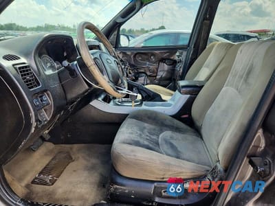 Zdjęcie 7 z 13 samochodu: 2006 MERCURY MARINER VIN:4M2YU57106KJ18835 - miniatura