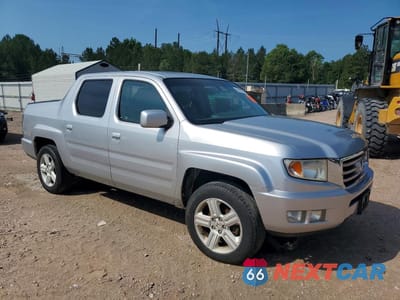 Czwarte zdjęcie samochodu z boku: 2012 HONDA RIDGELINE RTL VIN:5FPYK1F55CB452223 - miniatura