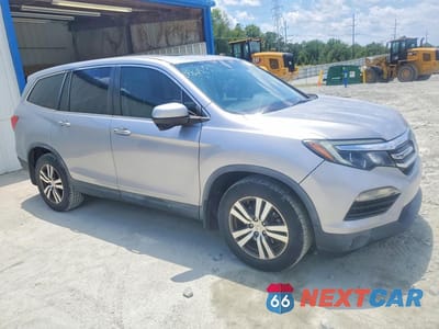 Czwarte zdjęcie samochodu z boku: 2017 HONDA PILOT EXL VIN:5FNYF5H55HB008056 - miniatura
