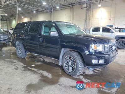 Czwarte zdjęcie samochodu z boku: 2014 HONDA RIDGELINE SPORT VIN:5FPYK1F70EB004234 - miniatura