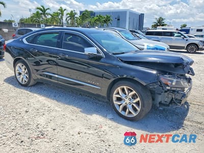 Czwarte zdjęcie samochodu z boku: 2017 CHEVROLET IMPALA PREMIER VIN:2G1145S37H9162120 - miniatura