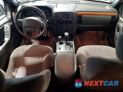 Zdjęcie 8 z 13 samochodu: 1999 JEEP GRAND CHEROKEE LAREDO VIN:1J4GW58S7XC553733 - miniatura