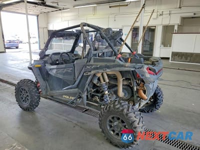 Trzecie zdjęcie samochodu z tyłu: 2022 POLARIS RZR XP 1000 UTILITY VEHICLE VIN:3NSNAE999NN867492 - miniatura