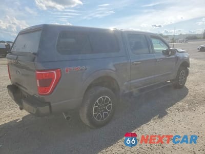 Trzecie zdjęcie samochodu z tyłu: 2022 FORD F150 SUPERCREW VIN:1FTFW1E89NFB24317 - miniatura