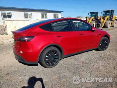 Trzecie zdjęcie samochodu z tyłu: 2023 TESLA MODEL Y VIN:7SAYGDEE8PF928230 - miniatura