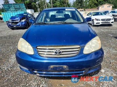 Piąte zdjęcie samochodu w środku: 2004 TOYOTA COROLLA LE VIN:1NXBR38E54Z312700 - miniatura