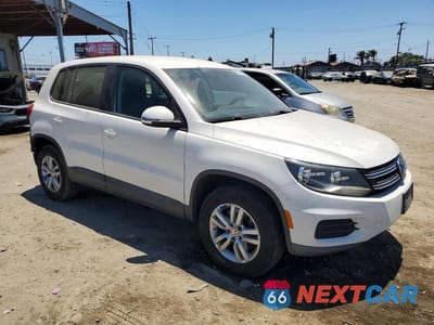 Czwarte zdjęcie samochodu z boku: 2013 VOLKSWAGEN TIGUAN S VIN:WVGAV3AX3DW609732 - miniatura
