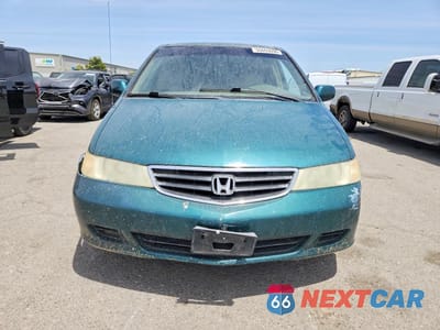 Piąte zdjęcie samochodu w środku: 2002 HONDA ODYSSEY EX VIN:2HKRL18602H519343 - miniatura