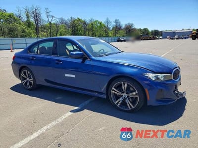 Czwarte zdjęcie samochodu z boku: 2023 BMW 330XI VIN:3MW89FF01P8D61060 - miniatura