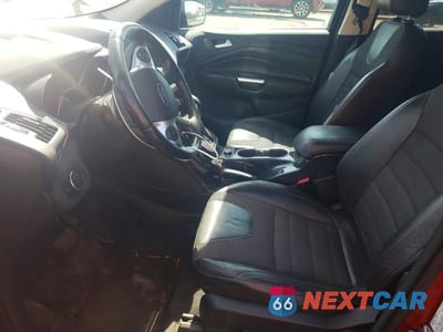 Zdjęcie 7 z 12 samochodu: 2013 FORD ESCAPE TITANIUM VIN:1FMCU9J94DUB12250 - miniatura