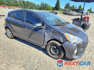 Czwarte zdjęcie samochodu z boku: 2014 TOYOTA PRIUS C TWO VIN:JTDKDTB38E1073334 - miniatura