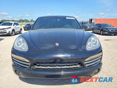 Piąte zdjęcie samochodu w środku: 2011 PORSCHE CAYENNE S HYBRID VIN:WP1AE2A24BLA92800 - miniatura