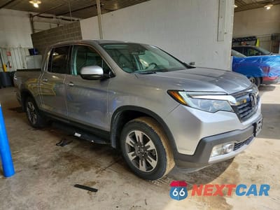 Czwarte zdjęcie samochodu z boku: 2017 HONDA RIDGELINE RTL VIN:5FPYK3F79HB016785 - miniatura